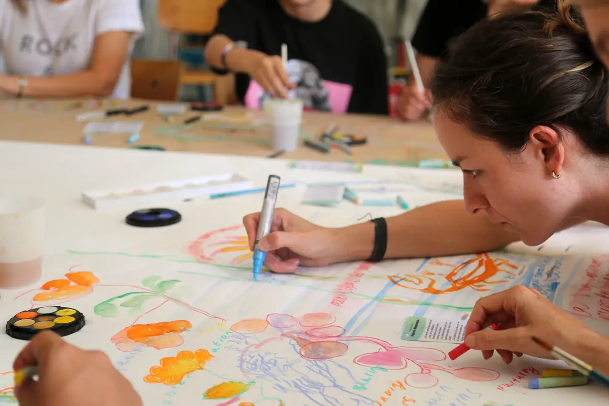 participant in drawing workshop at Documenta festival, Germany