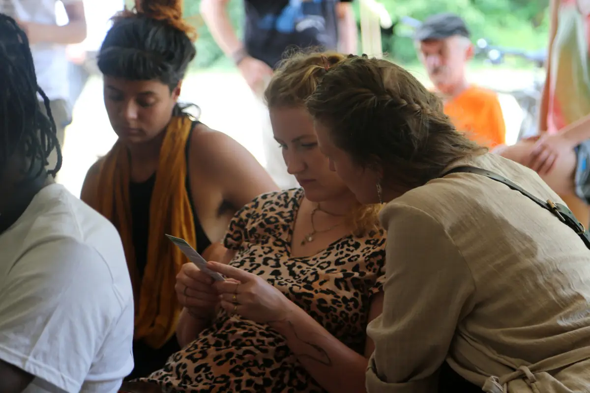 participants in workshops reading Planet Abundance cards