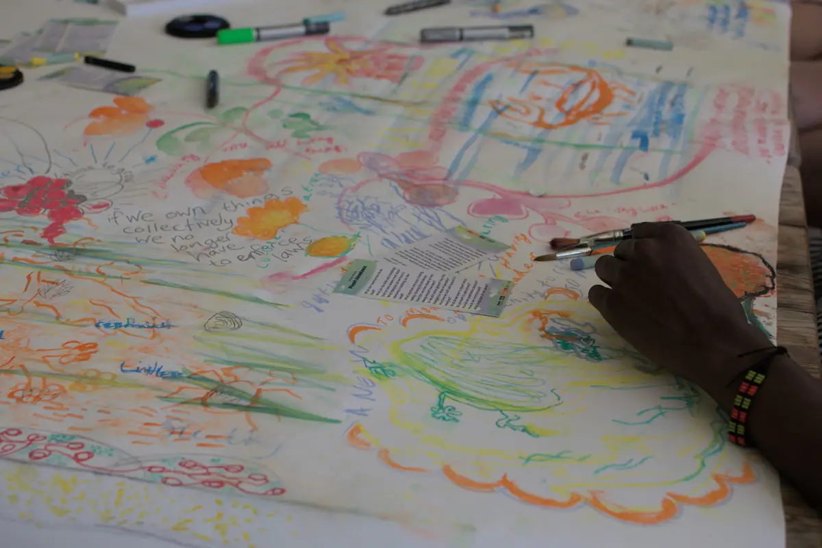 large colourful drawing on table